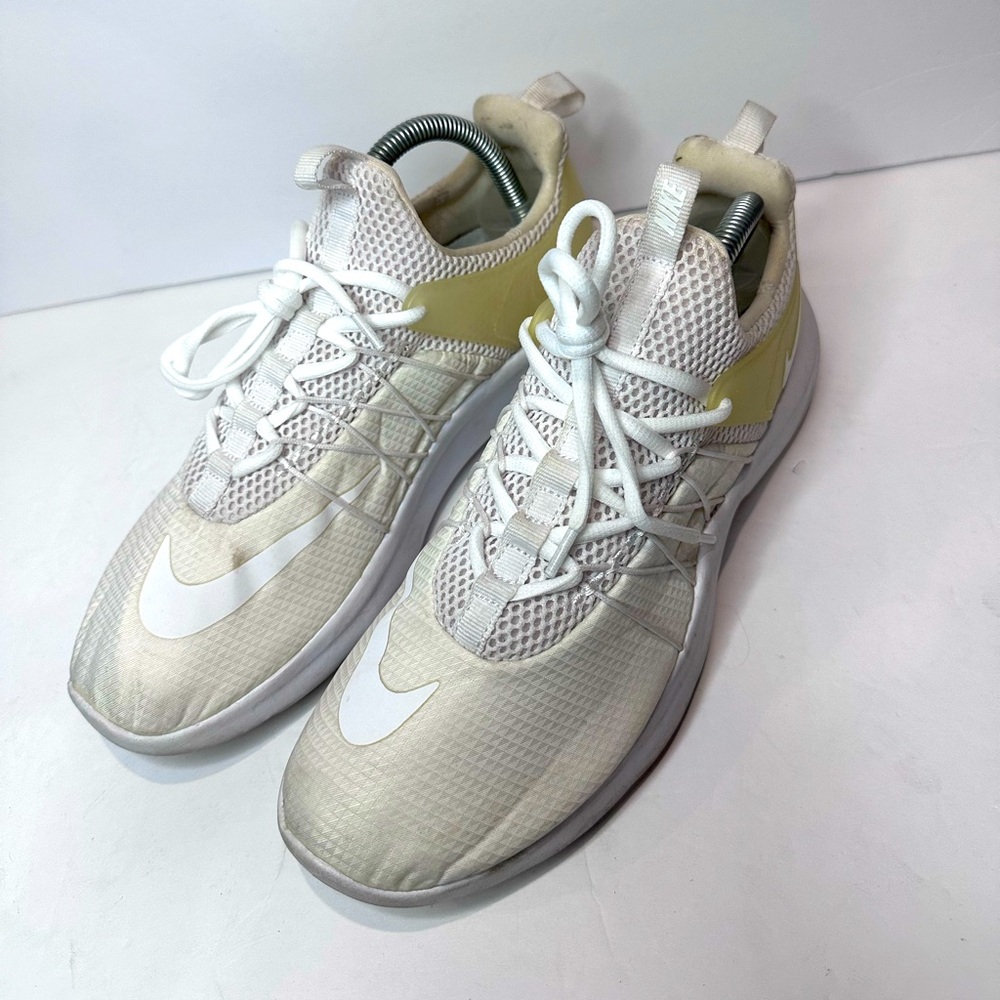 Used women’s Nike Cream and White Athletic Shoes